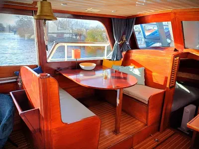 a small table in the back of a boat at Motorjacht Flint in Amsterdam