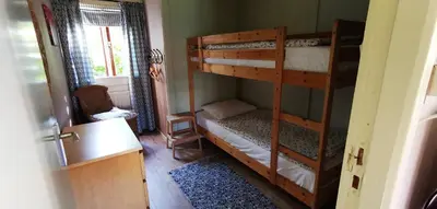 a bedroom with two bunk beds in a room at Bed & Breakfast Prins Hendrik (Zuidschermer) in Zuidschermer