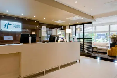 a lobby of a hotel with a reception desk at Holiday Inn Express Amsterdam - South by IHG in Amsterdam