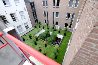 an aerial view of a courtyard in a building at Citycenter Residence in Amsterdam