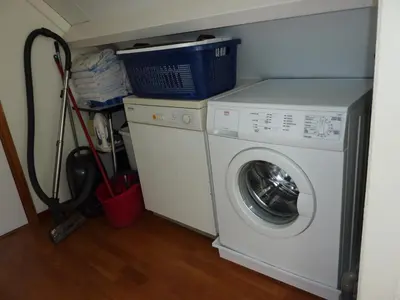 a washer and dryer in a small room at Studio Zandvoort in Zandvoort