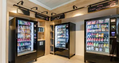 two large refrigerators in a store with drinks at PLAZA Premium Almere in Almere