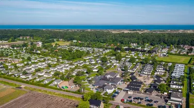 an aerial view of a parking lot with condos at EuroParcs Parc du Soleil in Noordwijk aan Zee