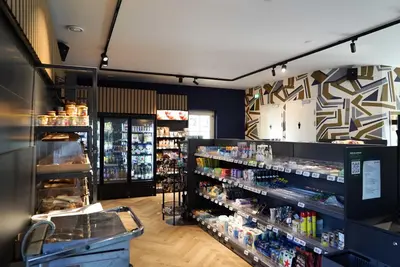 a store with a lot of products on display at EuroParcs Noordwijkse Duinen in Noordwijk aan Zee