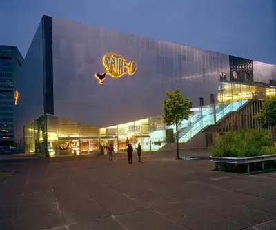 a large building with a sign on the side of it at Studio Amsterdam in Amsterdam