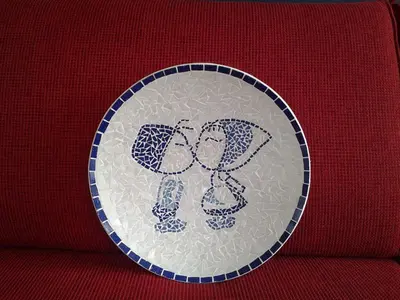 a plate with two hearts on it on a red table at De Krasse Man in Edam