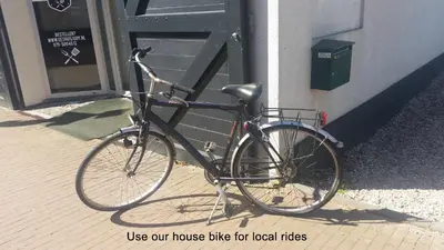 a bike is parked next to a building at Zoetermeer City Center Loft Apartment in Zoetermeer