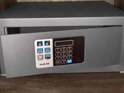 a microwave oven with its door open on a table at Hotel New Kit in Amsterdam