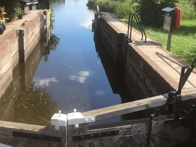 two locks of a canal with the gates open at Het Pulletje in Westzaan