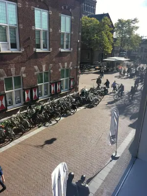 a group of bikes parked in front of a building at Appartementen Purmerend A in Purmerend