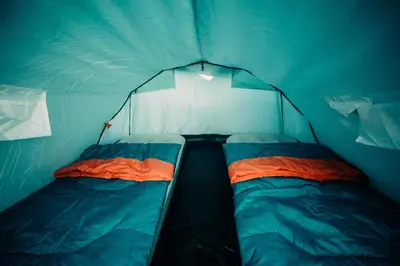a blue tent with two sleeping bags in it at The ESN Kingsday Campsite in Amsterdam