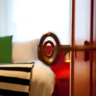 a close up of a room with a bed at Skotel Amsterdam, Hotelschool The Hague in Amsterdam