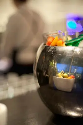 a bowl of vegetables is sitting on a table at Skotel Amsterdam, Hotelschool The Hague in Amsterdam