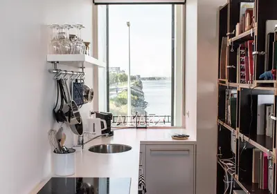 a kitchen with a sink and a window at SWEETS - Sluis Haveneiland in Amsterdam