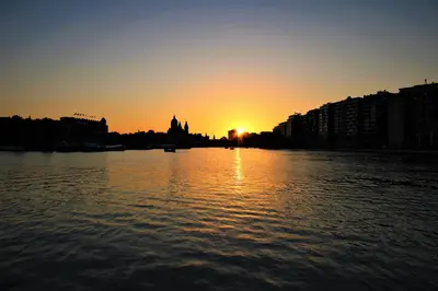 a sunset over a large body of water at Felicitas in Amsterdam