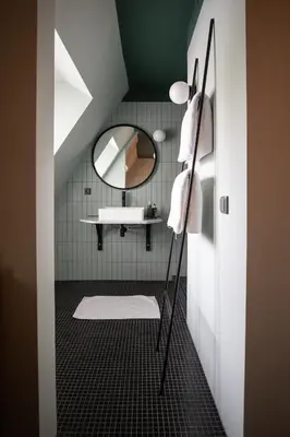 a bathroom with a sink and a mirror at Seabreeze Suites - near Zandvoort aan Zee in Overveen