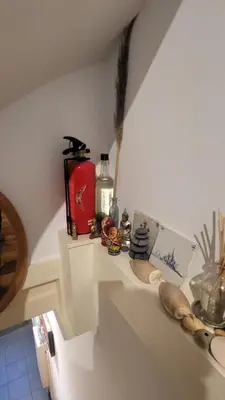 a kitchen with a counter with decorations on it at Velvetamsterdam in Amsterdam
