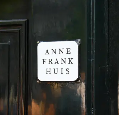 a sign on a door that readsnance fraud huts at Villa360 in Amsterdam