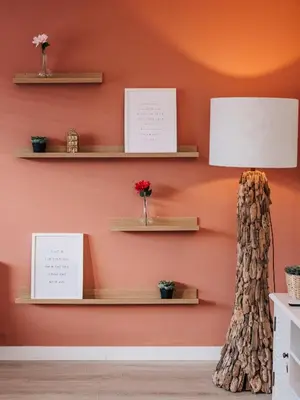 a room with orange walls and shelves and a tree stump at Casa del Mar Zandvoort in Zandvoort