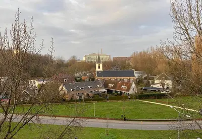 a view of a city with a park and buildings at XO Hotels Park West in Amsterdam
