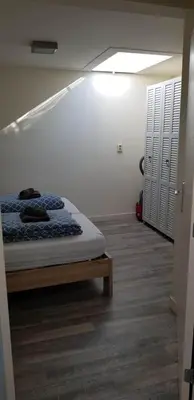 a bedroom with a bed in a room at JaBaKi Garden House in Hoofddorp