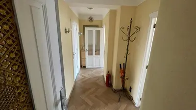 a hallway with a room with a wine rack at Beach Apartments Seaview in Zandvoort