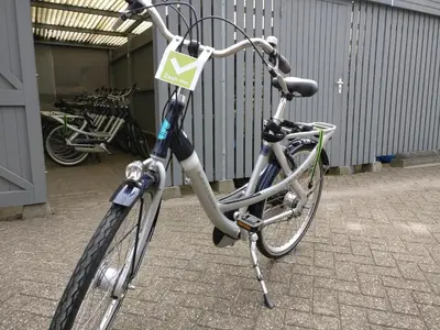 a bike parked in a building with a sign on it at Best Western Zaan Inn, Amsterdam - Zaandam in Zaandam
