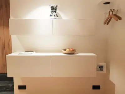 a white counter with a bowl of fruit on it at 23 SouS in Amsterdam