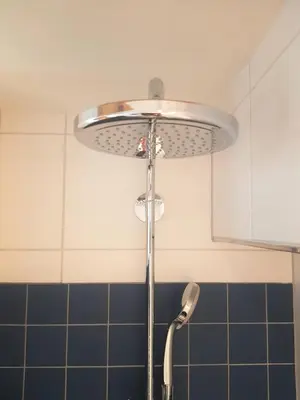 a shower in a bathroom with a shower head at 23 SouS in Amsterdam