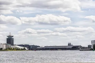 a large body of water with a city in the background at Mps Holland in Amsterdam