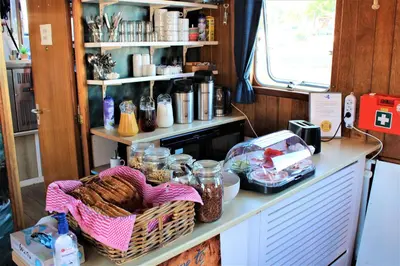 a kitchen with a counter with baskets of food at Mps Holland in Amsterdam
