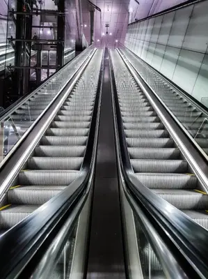 an empty escalator in a building at Houseboat Amsterdam - Room with a view in Amsterdam