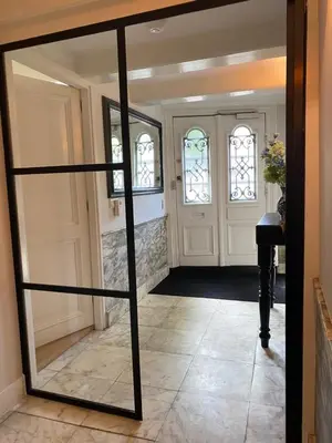 a mirror in the hallway of a home at Singel Residence in Amsterdam