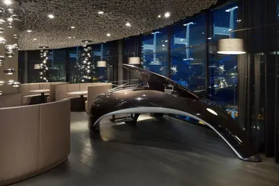 a restaurant with a whale sitting on a table at Fletcher Hotel Amsterdam in Amsterdam