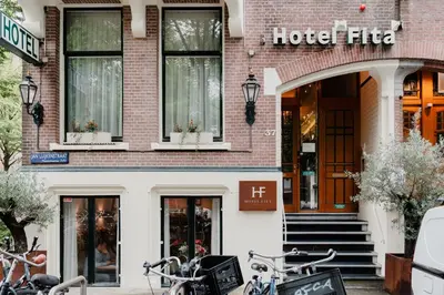 a hotel with bikes parked outside of it at Hotel Fita in Amsterdam