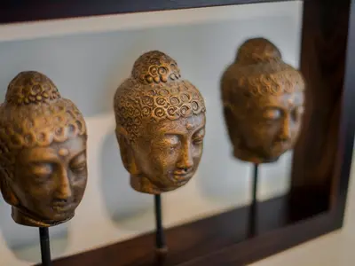 a group of vases on display on a shelf at Palm Apartment Amsterdam in Amsterdam