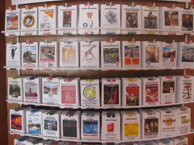a shelf of books in a store at Passengership Avanti in Amsterdam