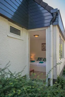 a view of a bedroom from the outside of a house at Amsterdam Beach in Zandvoort