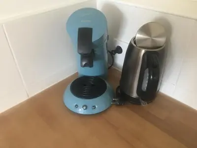 a small blue blender next to a trash can at Garden Room or Economy Room in Amsterdam