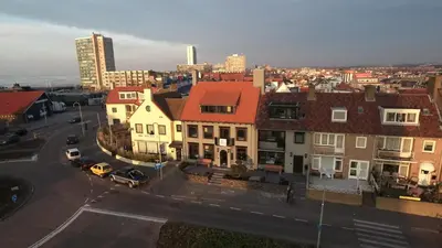 an aerial view of a city with buildings and cars at Hotel Bell in Zandvoort