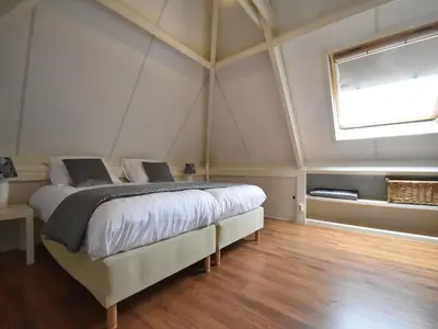 a bedroom with a bed in a tent at Family Home in Zeewolde by Forest Trails in Zeewolde