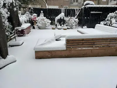 two beds covered in snow in a yard at BEAUTIFUL APARTMENT WiTH ASIAN STYLE BEDROOM NEAR RAI & CENTER in Amsterdam