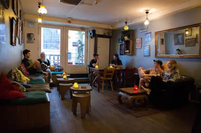 a group of people sitting in a room at Flying Pig Downtown in Amsterdam