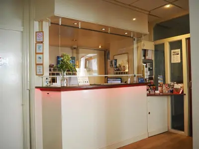 a counter in a store with a large mirror at Euphemia Budget Old City Canal Zone in Amsterdam