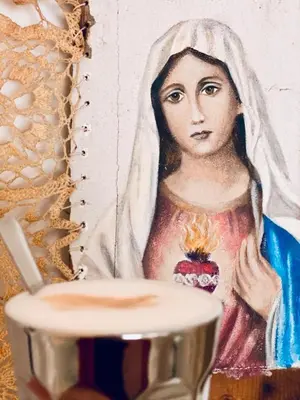 a painting of a woman with a candle in her hand at Cavalli's Cottage in Bilthoven