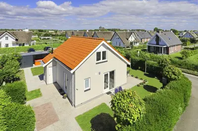 an overhead view of a house with an orange roof at Paleisje Noordwijk in Noordwijk