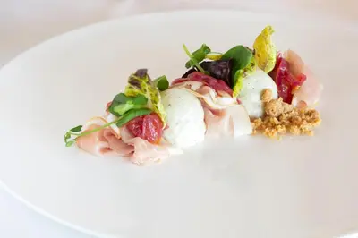 a plate of food on a white plate at Restaurant-Hotel de Watergeus in Noorden