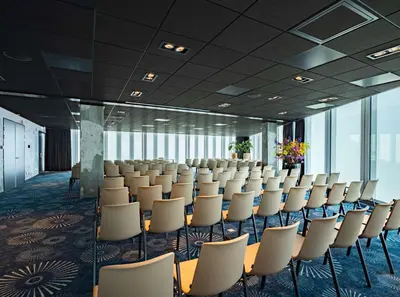 a conference room with rows of chairs in it at nhow Amsterdam Rai in Amsterdam