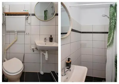 a bathroom with a toilet and a sink and a mirror at Amsterdam Beach Apartment 65 in Zandvoort