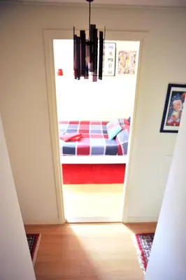 a hallway with a bed in a room at La Corte Sconta B&B in Amsterdam